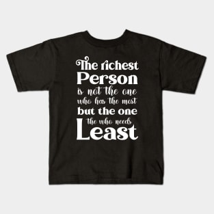 The richest person is not the one who has the most, but the one who needs the least | Word of God Kids T-Shirt